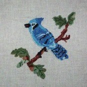Blue jay hooked rug.