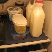 Plastic placemat on shelf.