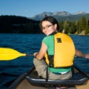 A girl in a canoe.