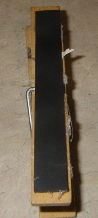 Gluing magnetic strip to clothes pin.
