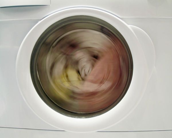 Why does a washing machine make loud noises?