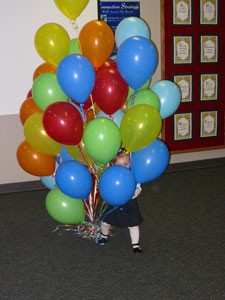 Two Year Old With Balloons