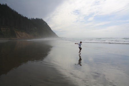 boy on the beach at Manzanita, OR