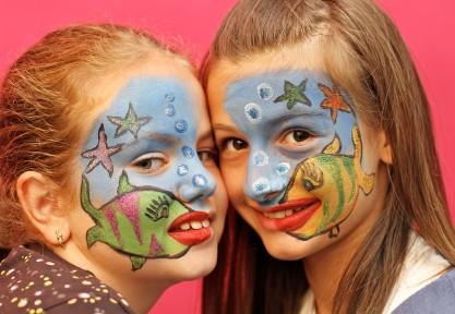 picture of two kids with face paint
