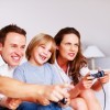 Parents and Child Playing a Video Game