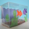 fish tank bank with orange and purple fish cutouts on front