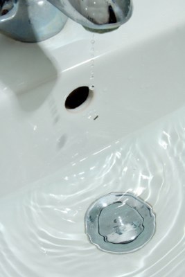 Retrieving Jewelry Dropped in a Sink Drain, Water dripping in bathroom sink