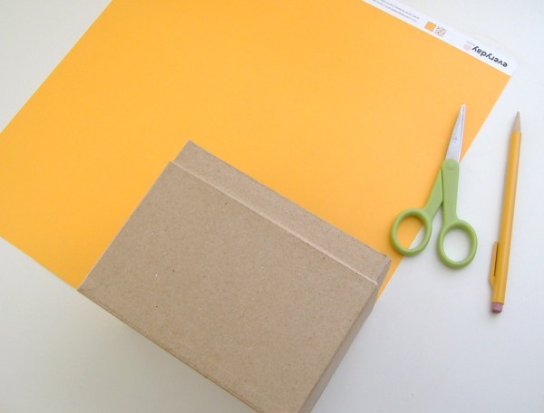 Assorted paper and supplies for Gift House Box.