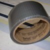 A roll of duct tape to capture insects.