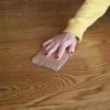 Use a piece of cardboard instead of fine sandpaper on wood.