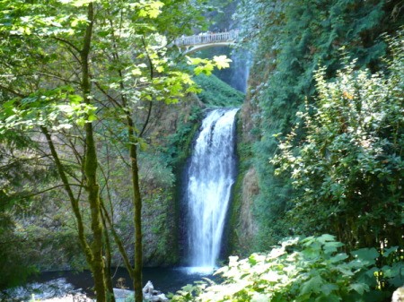 Multnomah Falls in Oregon, the lower falls with the bridge in the distance.