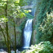 Multnomah Falls in Oregon, the lower falls with the bridge in the distance.
