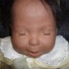 Closeup of doll's eyes closed
