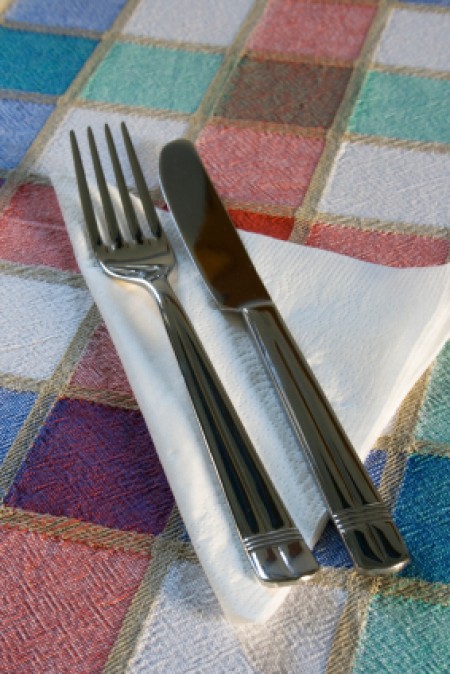 Fork and knife on a napkins