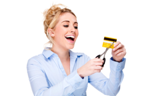Getting Out of Debt, Picture of a woman cutting a credit card.