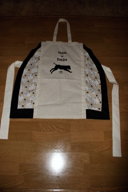 Finished apron made out of a canvas bag.