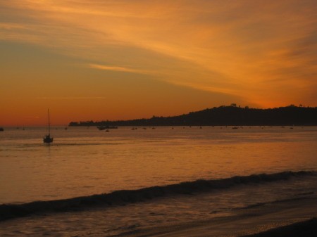 An orange sky at Butterfly Beach near Santa Barbara, California.