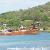 A rusted old shipwreck in Honduras.