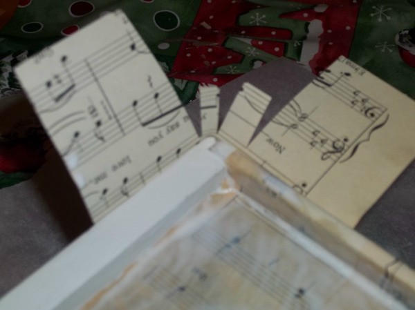 wrapping sheet music up around sides of drawer