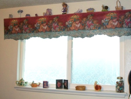 The finished decorative shelf over a frosted window.