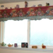 The finished decorative shelf over a frosted window.