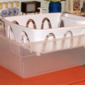 Dish strainer in platic storage tub base