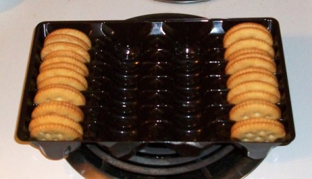 A cookie tray holding crackers