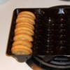 A cookie tray holding crackers