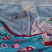 Hello Kitty clothing with lipstick stains.