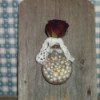 Light Bulb Wall Vase - finished bulb filled with beads
