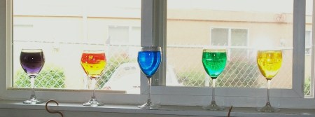 Wine glasses filled with colored water