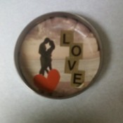 Closeup of love bottlecap magnet