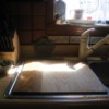 Kitchen sink with wooden cutting board cover