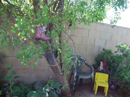 Cowgirl Boot Birdfeeder in Tree