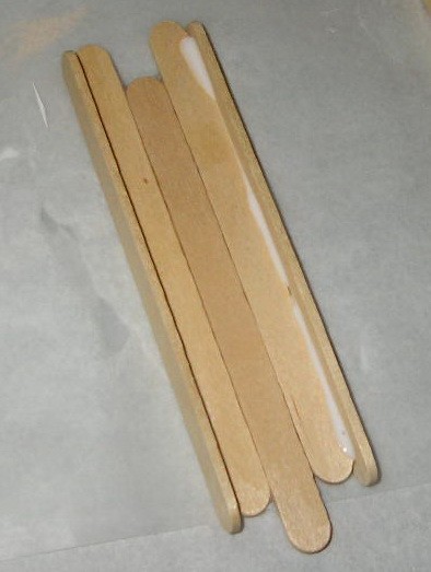 three base sticks with both perpendicular side sticks glued on