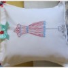 Finish embroidered cloth napkin pillow.