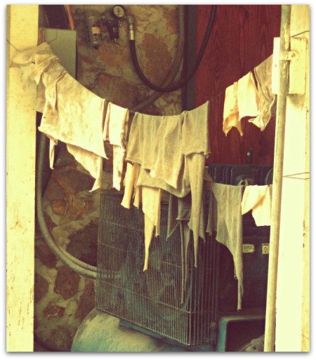 Laundry hanging on line in doorway