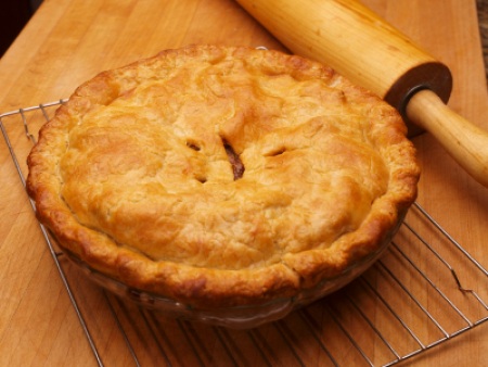 Apple Pie Recipes, Photo of an apple pie cooling.