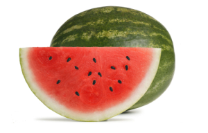 A slice of watermelon in front of a full watermelon.