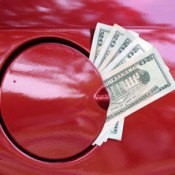 Saving Money on Gas, picture of money coming out of a cars gas tank