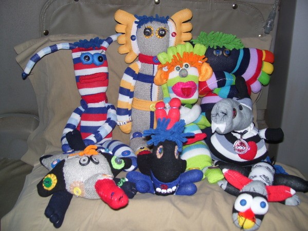 Group photo of several sock creatures.