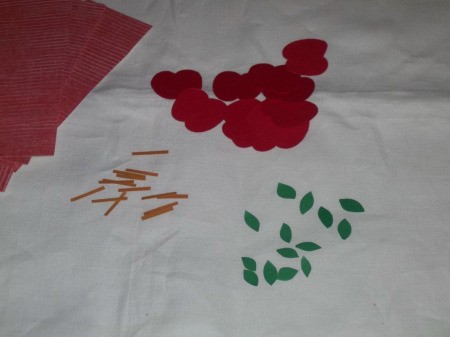 Pieces of cut up red and green paper