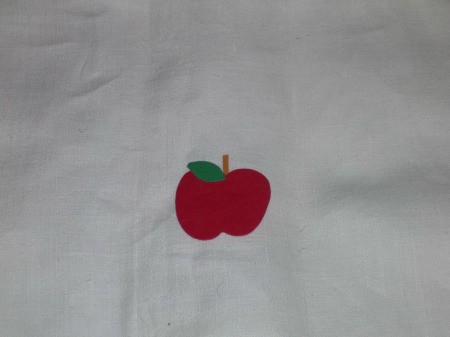 Red Paper apple with green leaf