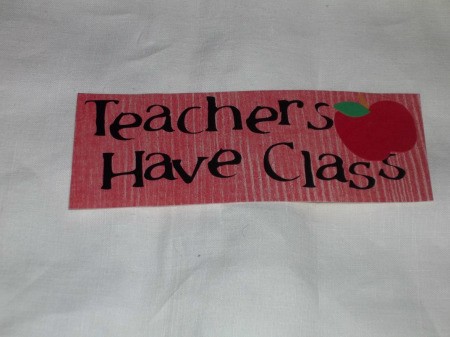Teachers Have Class written on Red paper with apple