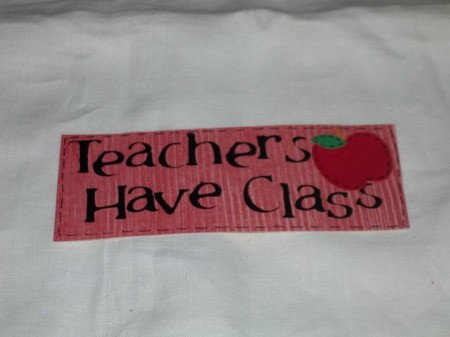 Teachers Have Class written on Red paper with apple 2