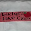 Teachers Have Class written on Red paper with apple 2