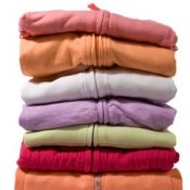 Storing Out of Season Clothing, Stack of folded sweaters in different colors