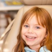 Smiling child in dental chair