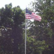 Flag pole in yard