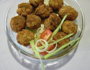 Salmon fritters in a bowl.